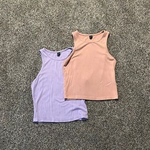 Two tank tops from shein. one is light purple and one is very light orange/brown